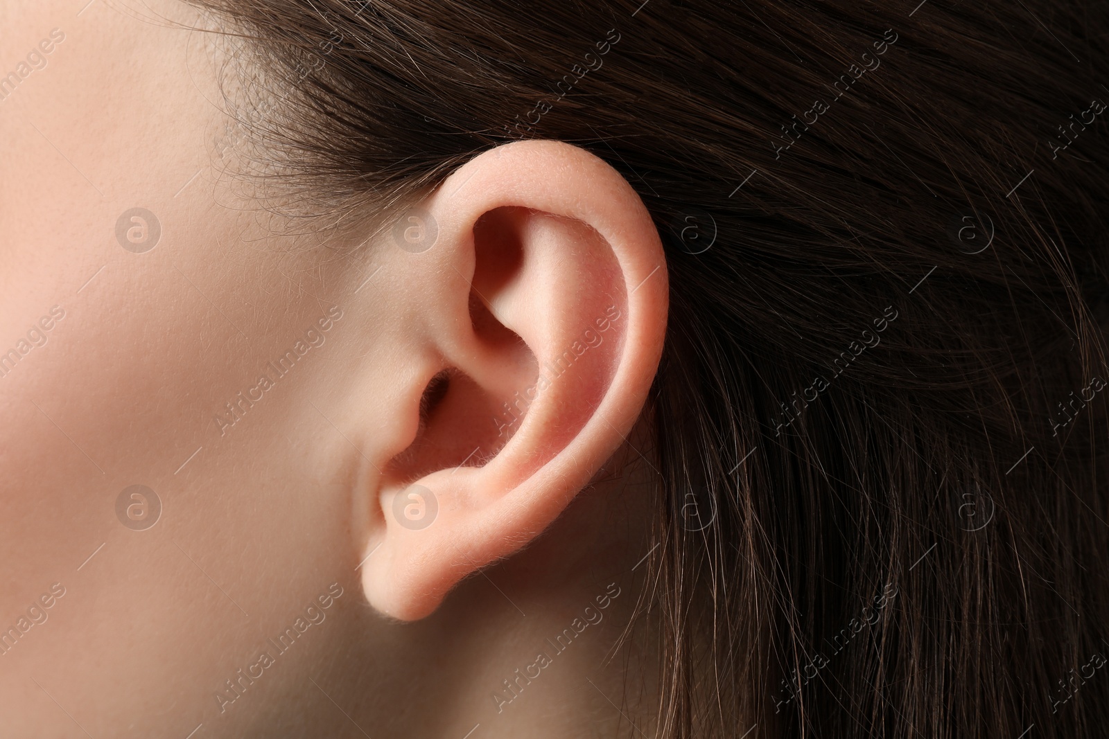 Photo of Closeup view of woman, focus on ear