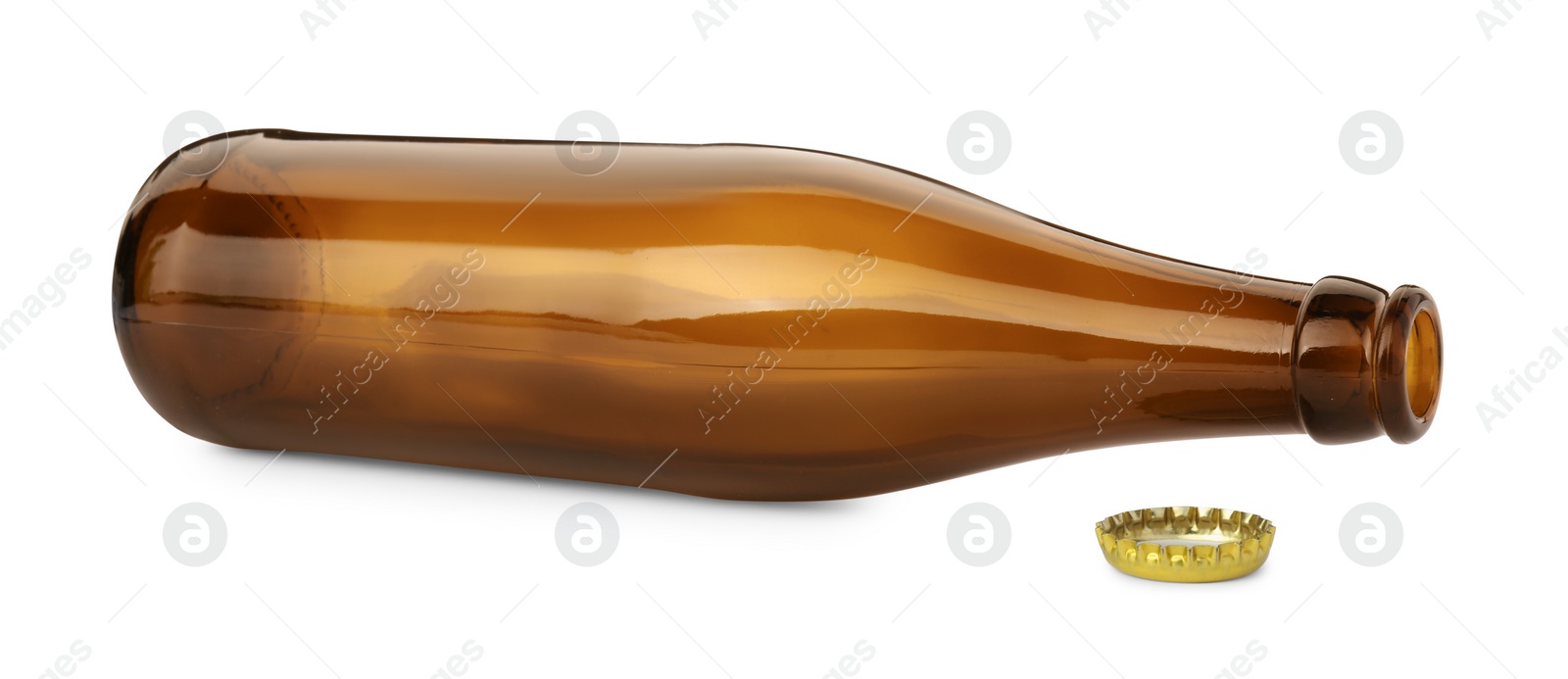 Photo of One empty brown beer bottle and cap isolated on white