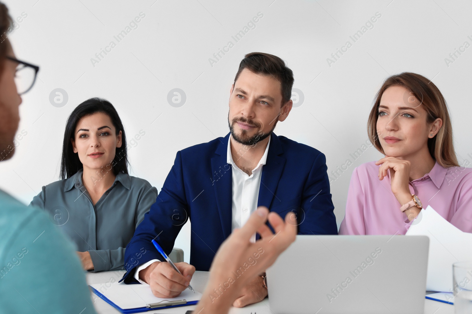 Photo of Human resources commission conducting job interview with applicant in office