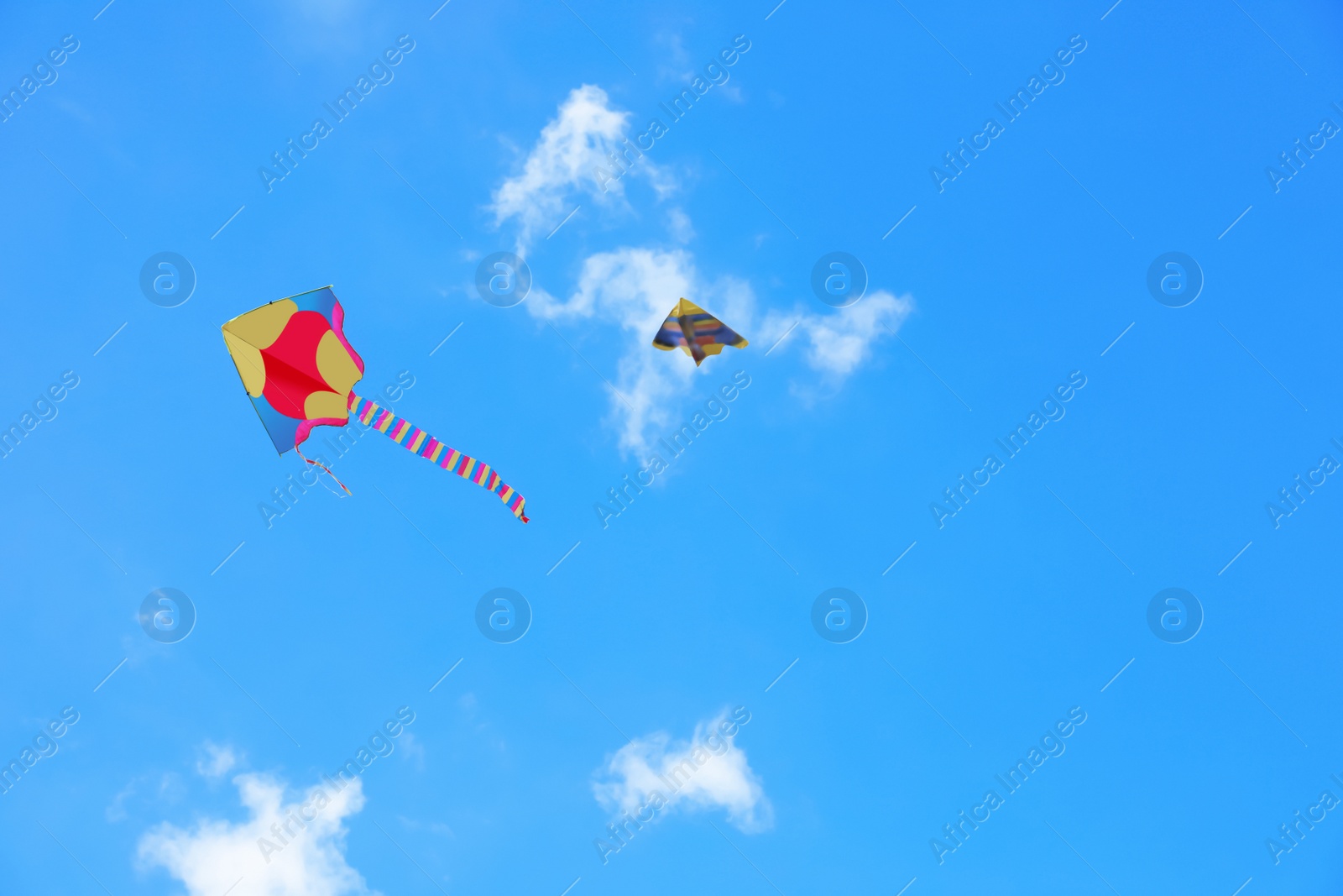 Photo of Beautiful kites drifting in blue sky