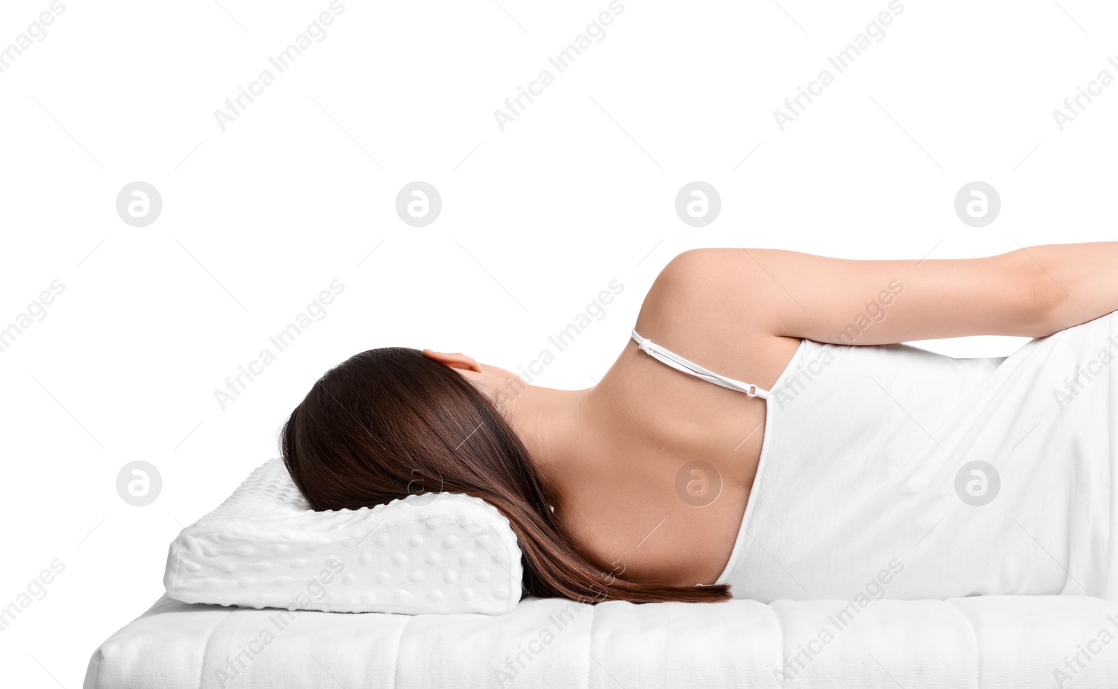 Photo of Woman sleeping on orthopedic pillow against white background