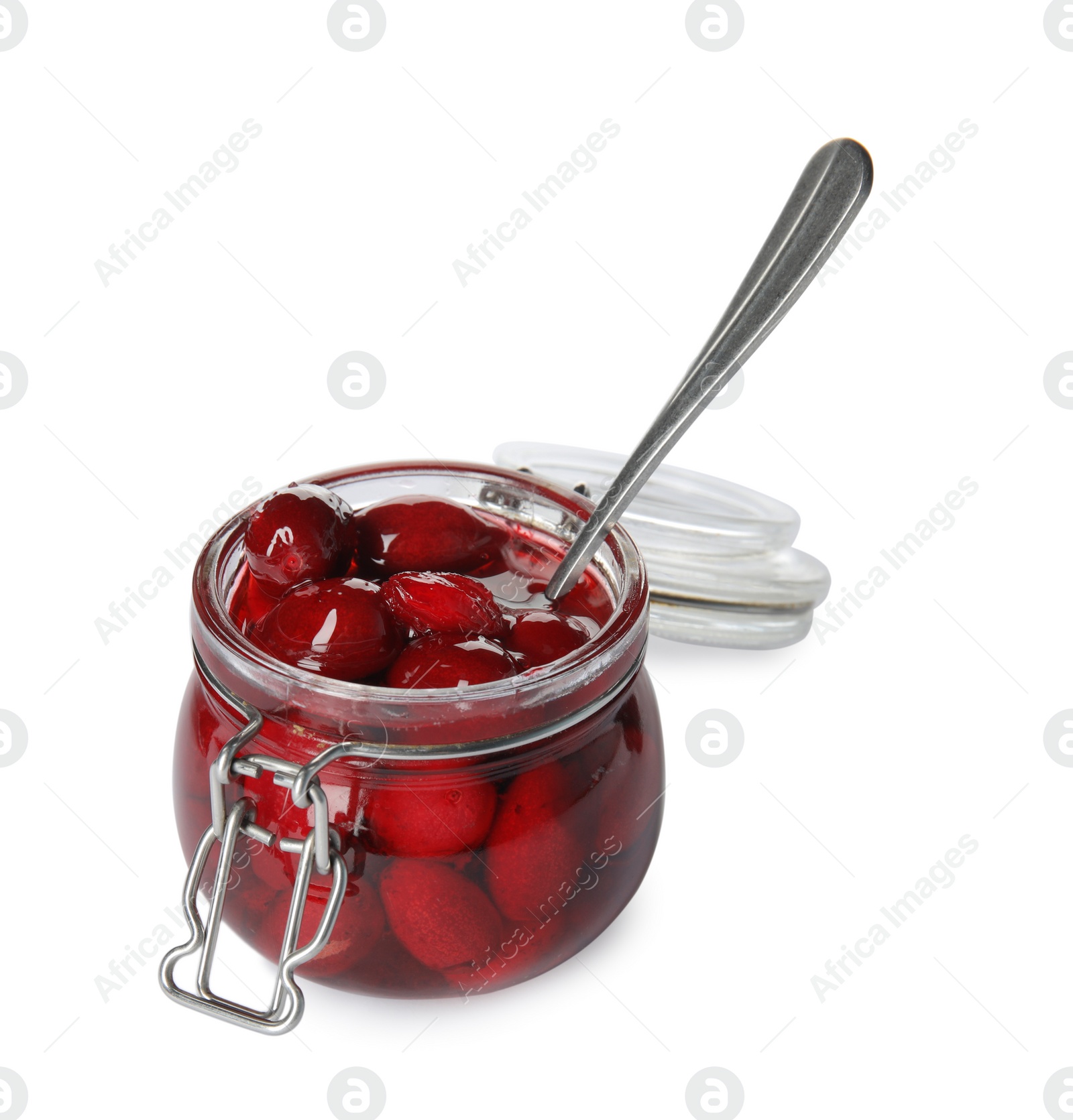 Photo of Delicious dogwood jam with berries and spoon in glass jar isolated on white