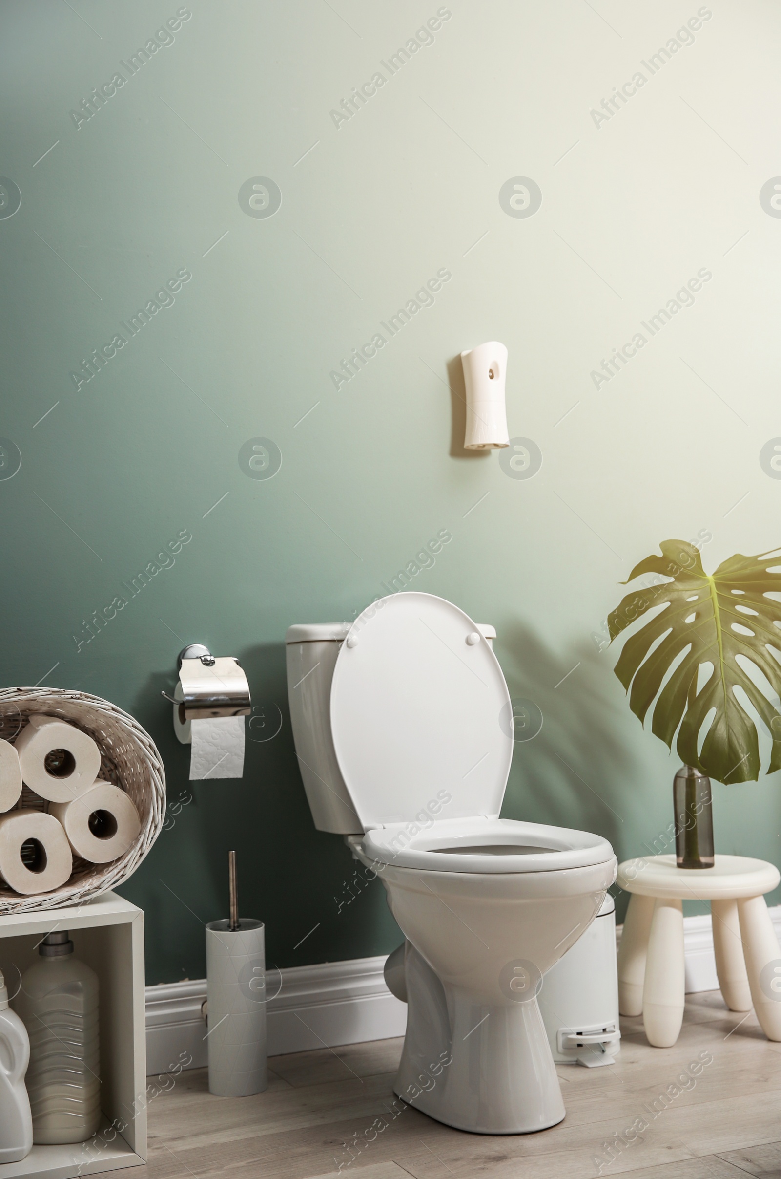 Photo of Bathroom interior with new ceramic toilet bowl