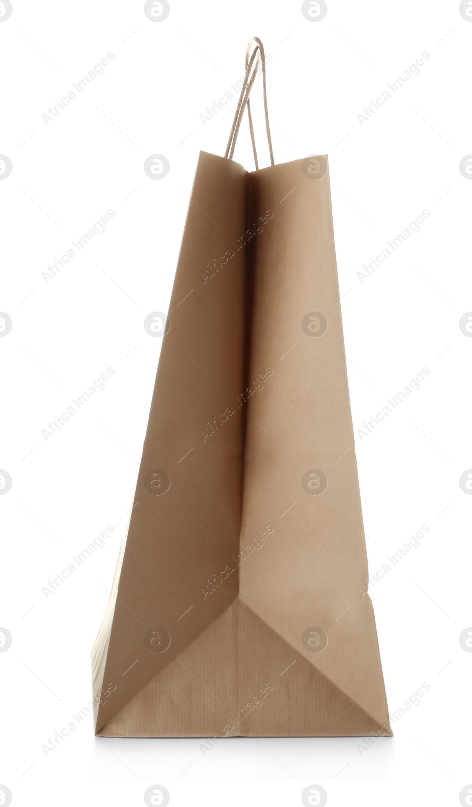 Photo of Empty paper shopping bag on white background