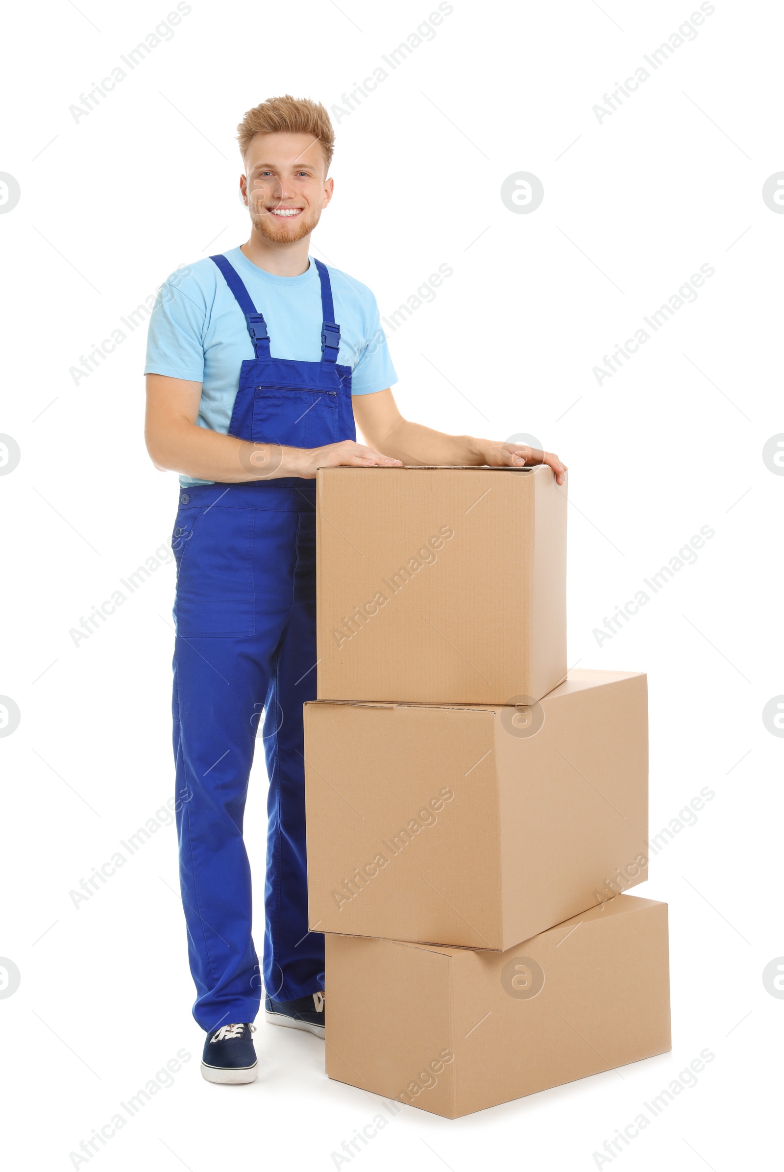 Photo of Portrait of moving service employee with cardboard boxes on white background