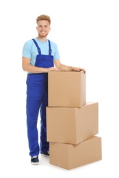 Photo of Portrait of moving service employee with cardboard boxes on white background