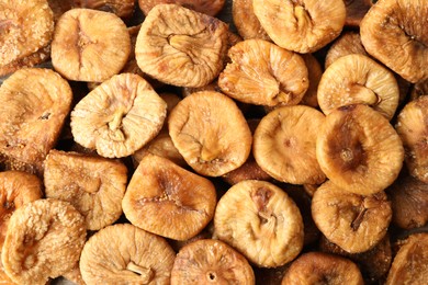 Many tasty dried figs on table, flat lay