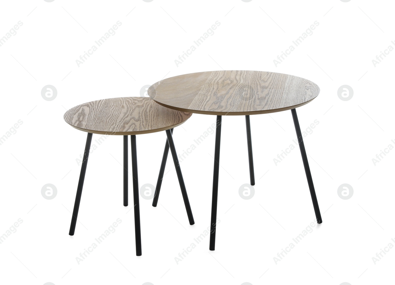 Photo of Empty wooden nesting tables isolated on white