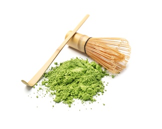 Powdered matcha tea, chashaku and chasen on white background