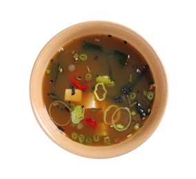 Bowl of delicious miso soup with tofu isolated on white, top view