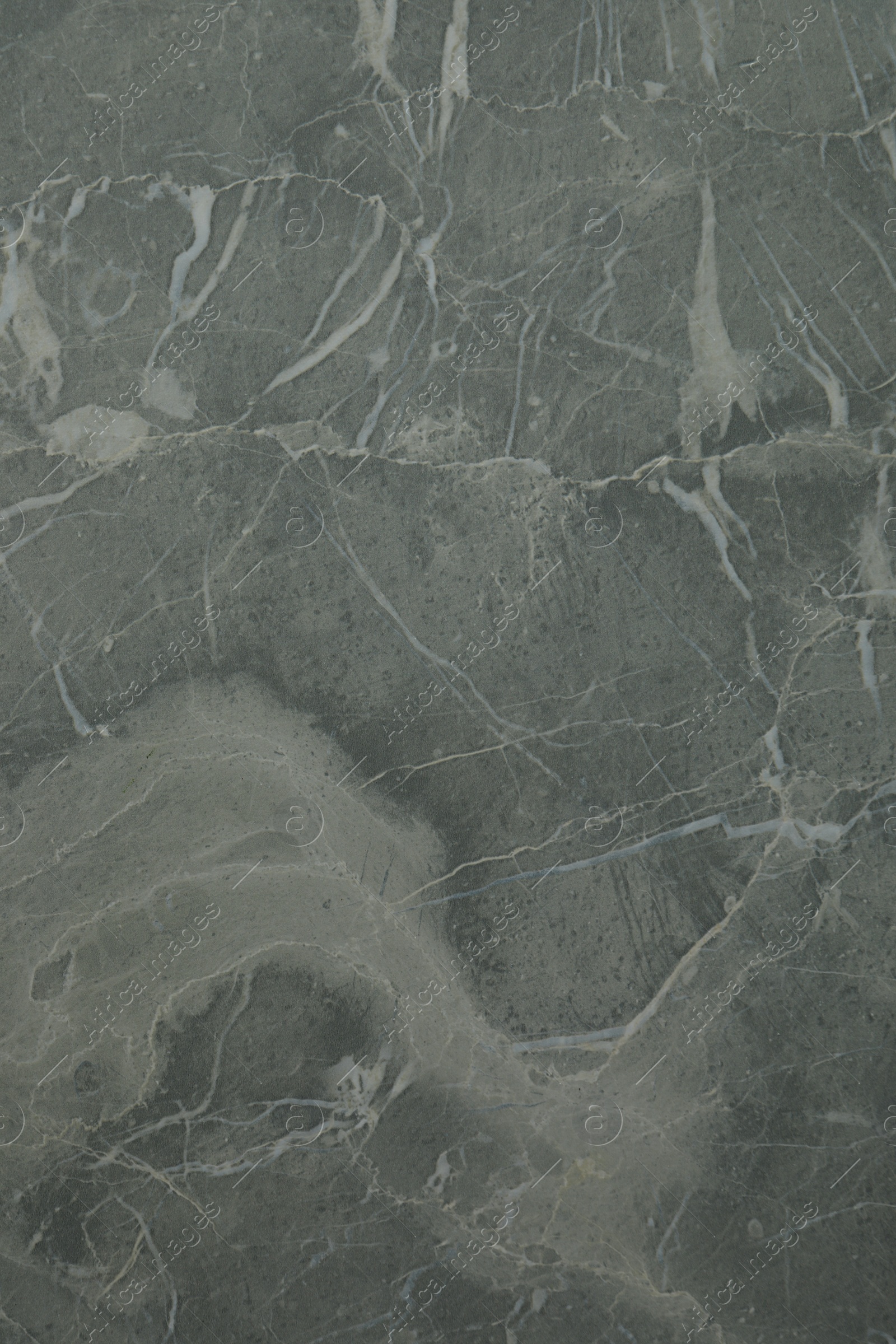 Photo of Texture of grey marble surface as background, closeup