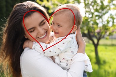 Image of Illustration of red heart and happy mother with her cute baby in park on sunny day