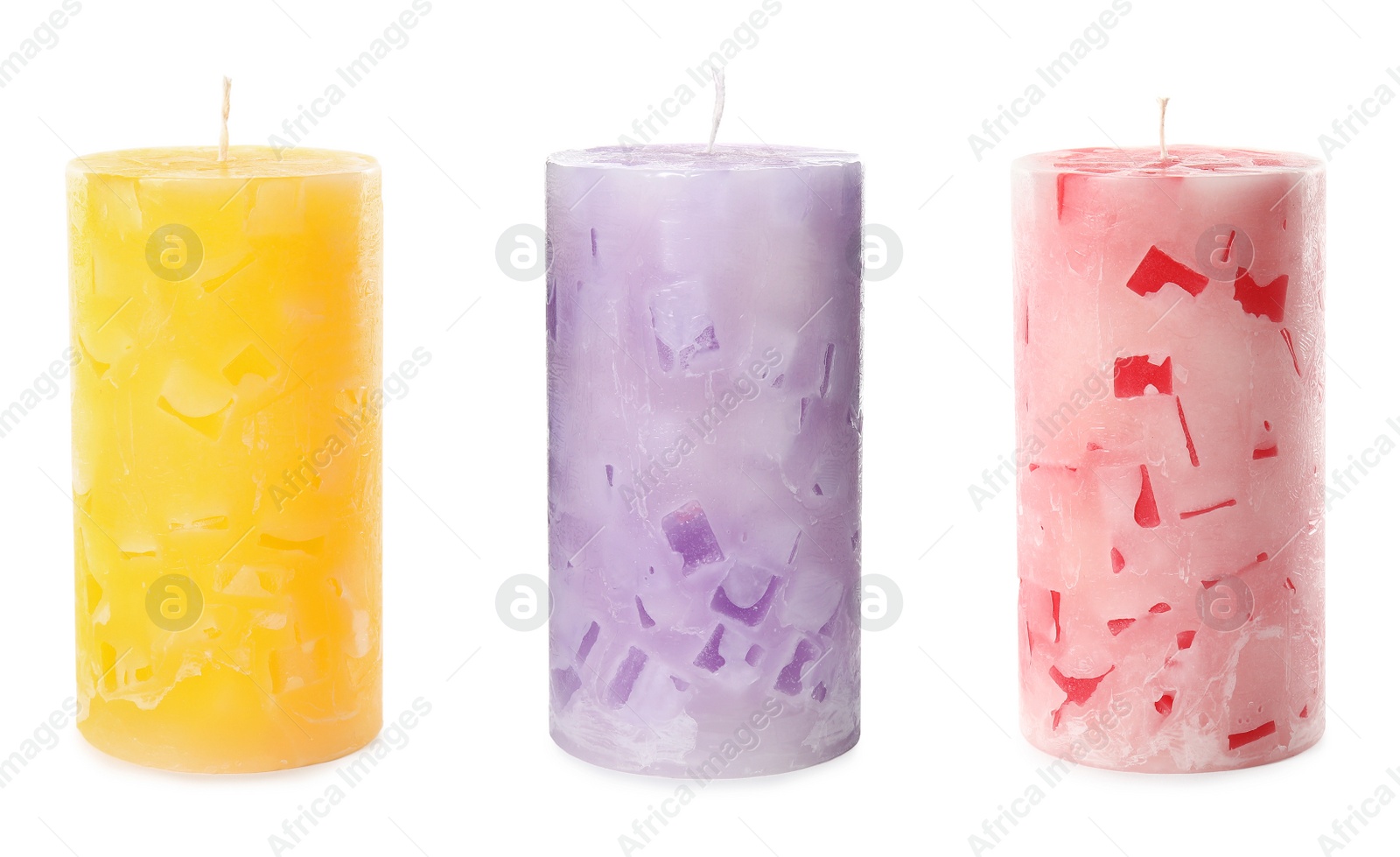 Image of Set of color wax candles on white background