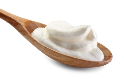 Photo of Sour cream in wooden spoon isolated on white