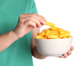 Photo of Woman eating crunchy cheesy corn sticks on white background, closeup