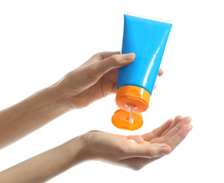 Photo of Woman applying sun protection cream on hand against white background, closeup