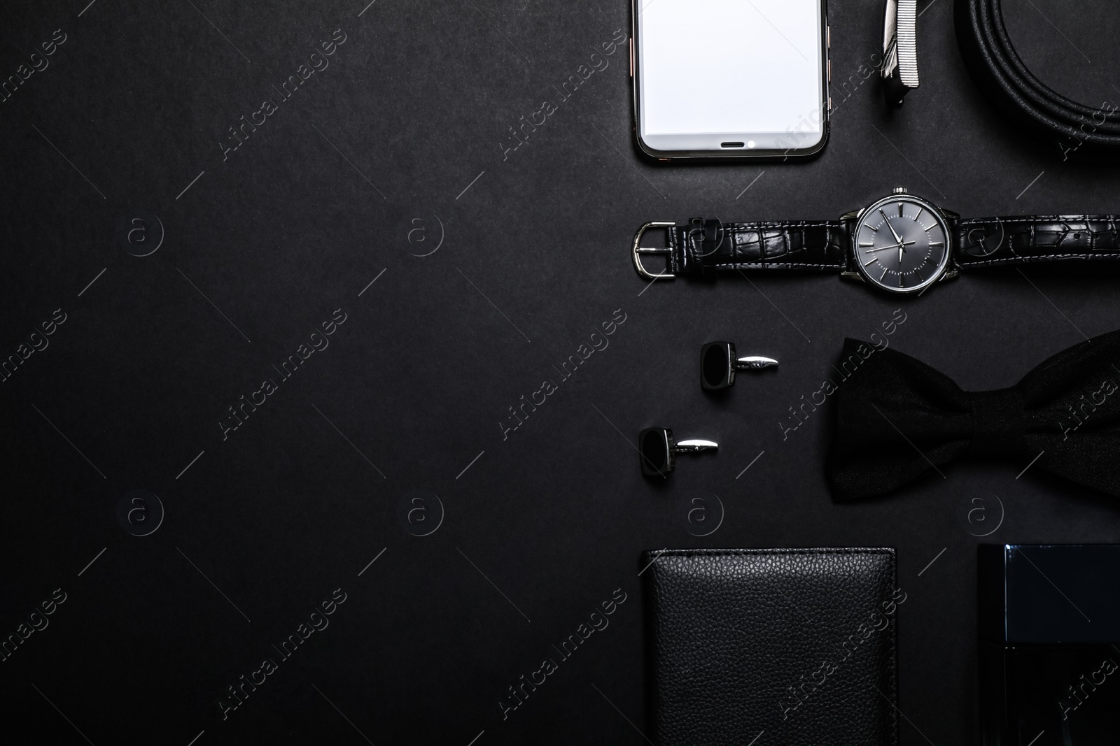 Photo of Flat lay composition with male accessories on black background, space for text