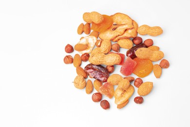 Photo of Pile of mixed dried fruits and nuts on white background, flat lay. Space for text