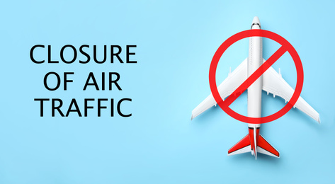 Image of Closure of air traffic through quarantine during coronavirus outbreak. Airplane and prohibition sign on light blue background, top view