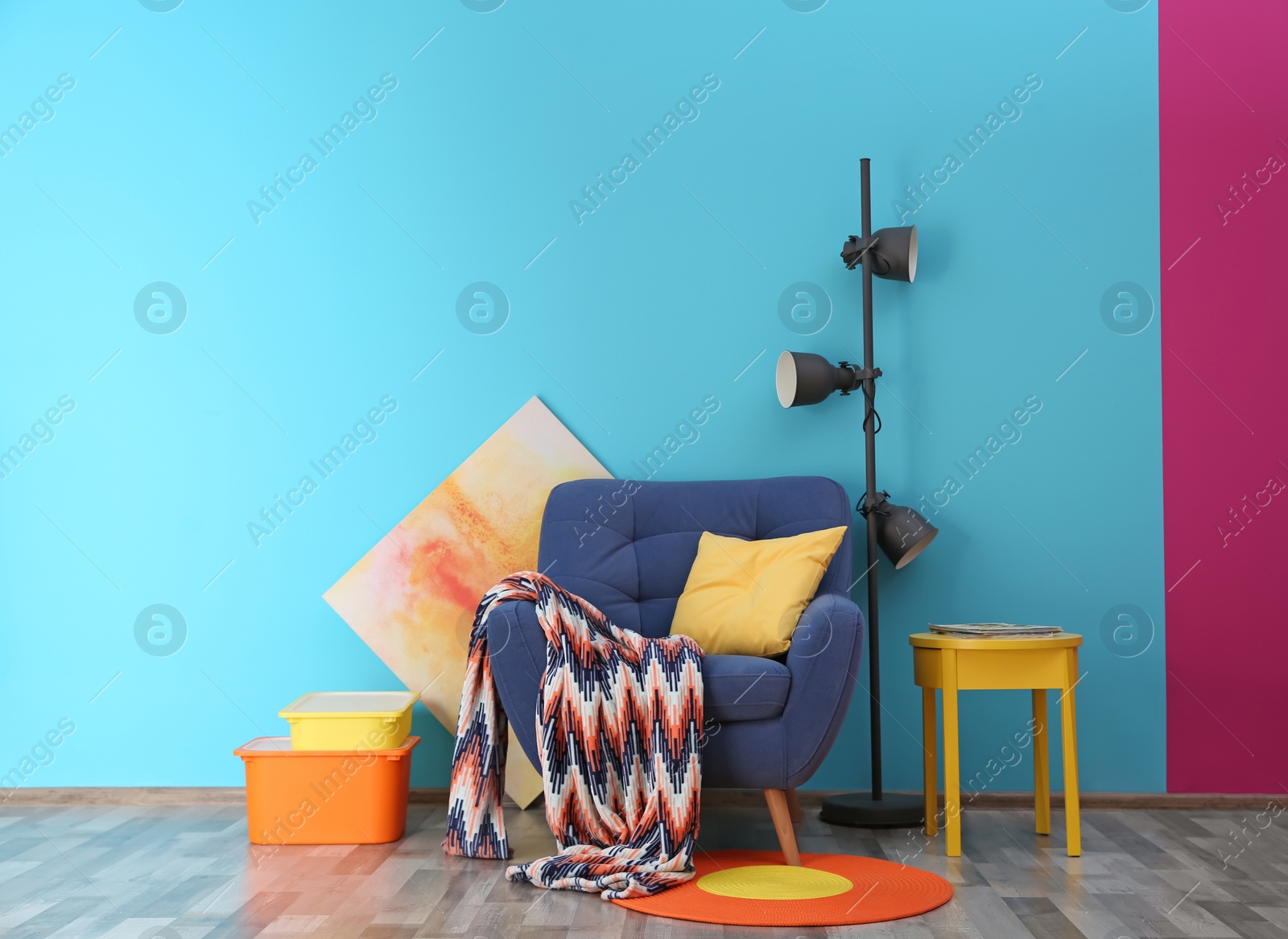 Photo of Modern bright interior with comfortable blue armchair