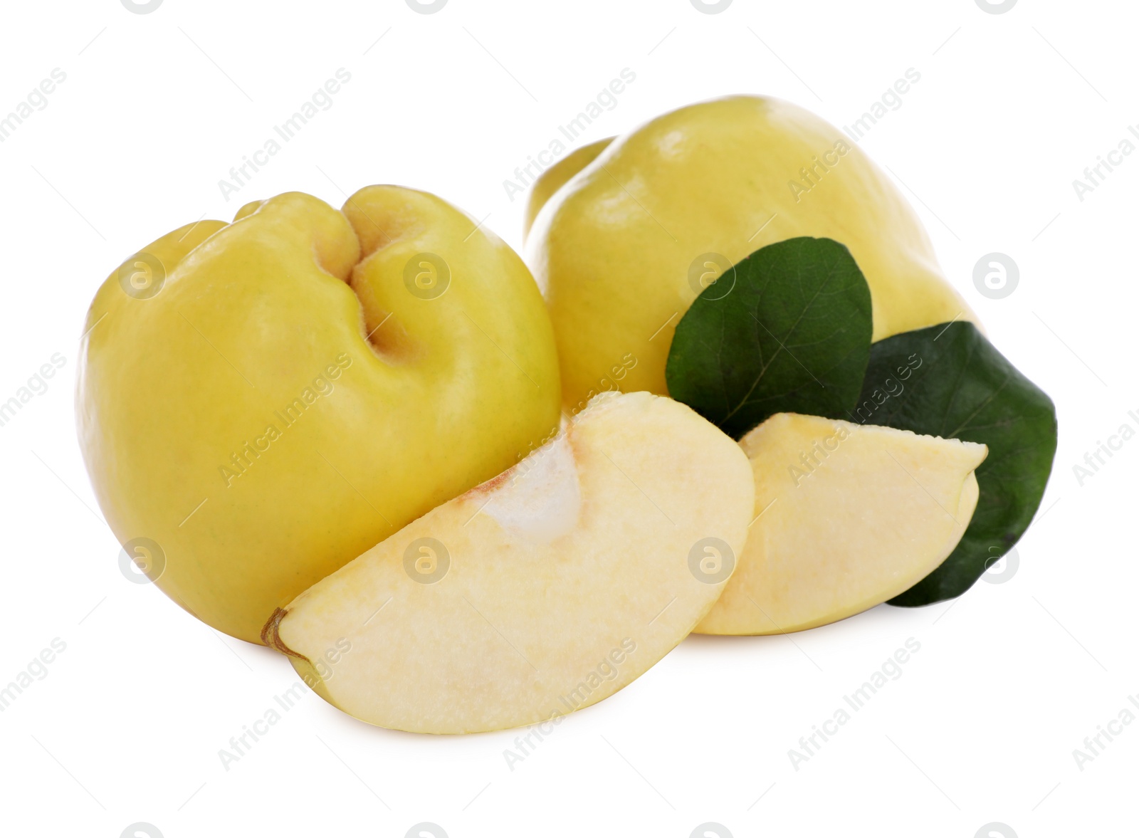 Photo of Ripe fresh quinces with green leaves on white background