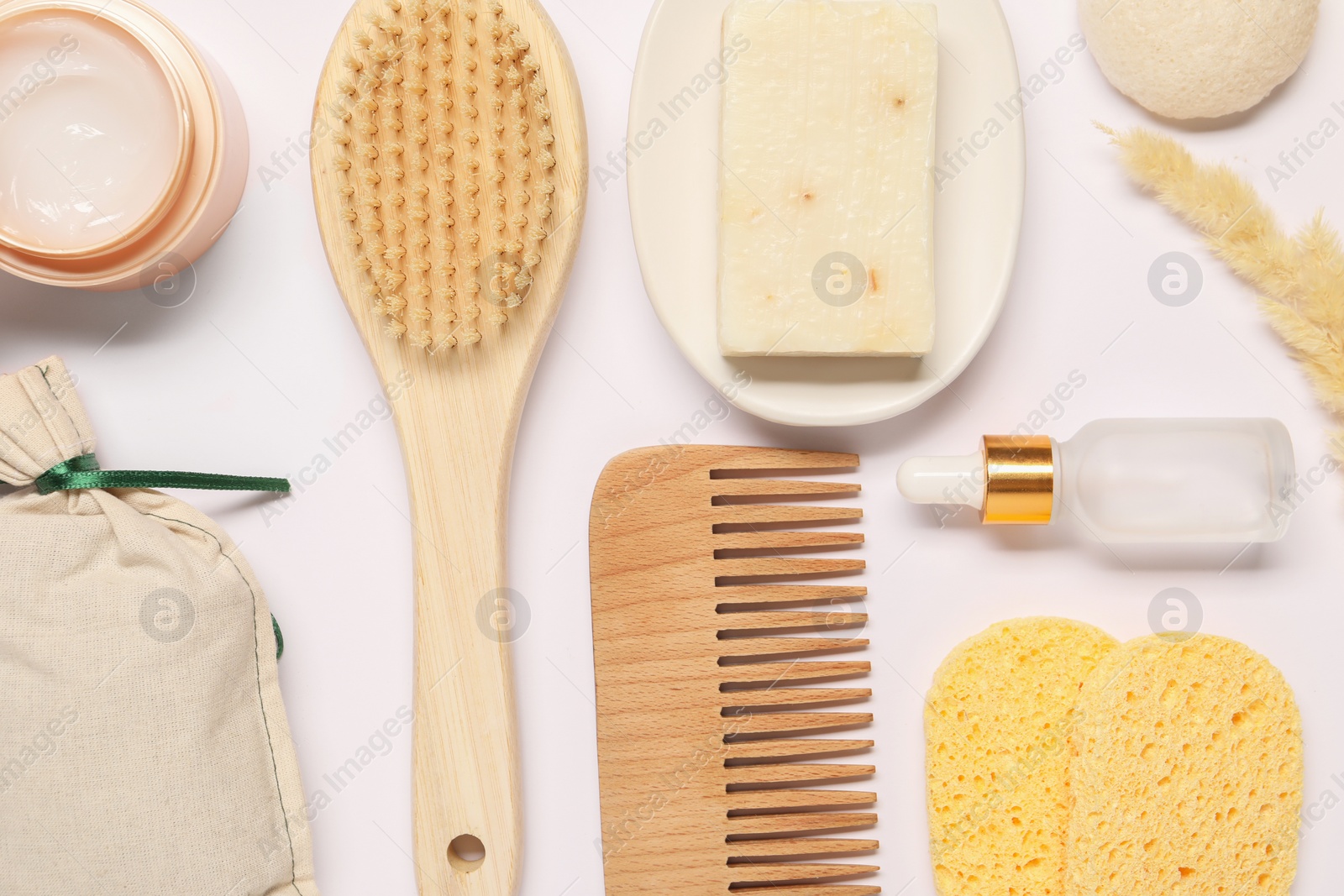 Photo of Bath accessories. Different personal care products and dry spikelet on white background, flat lay