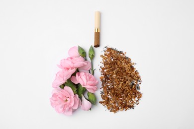 Photo of No smoking concept. Lungs made of dry tobacco, cigarettes and pink flowers on white background, flat lay