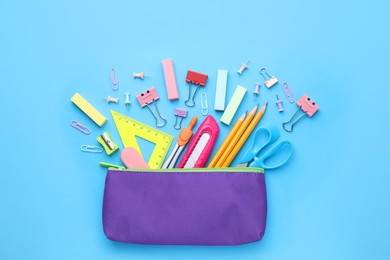 Photo of Back to school. Many different school stationery on light blue background, flat lay