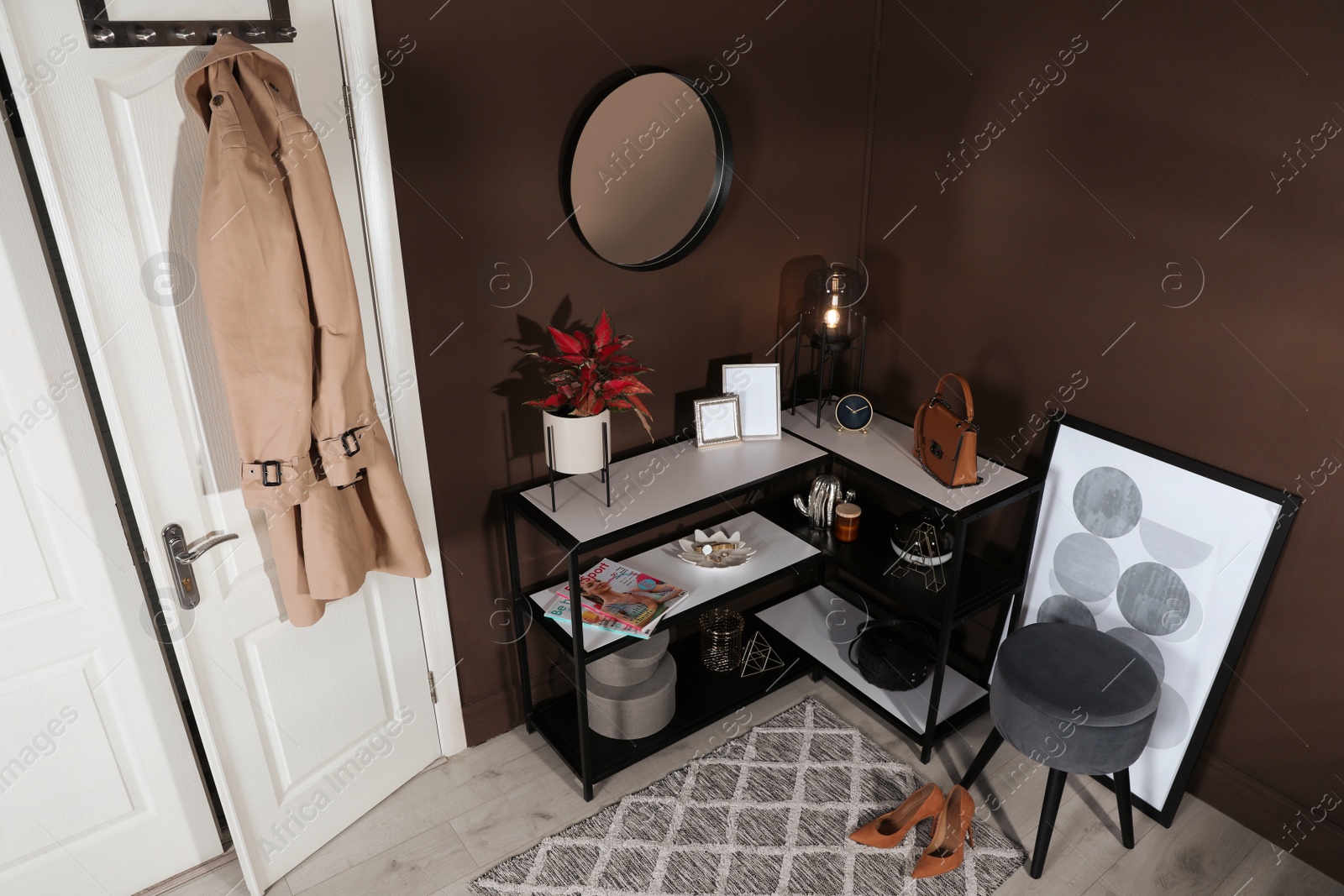 Photo of Hallway interior with console table and stylish decor, above view