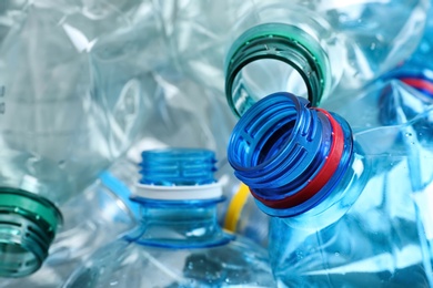 Photo of Many plastic bottles as background, closeup. Recycle concept