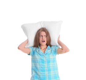 Photo of Young woman in pajamas with pillow on white background