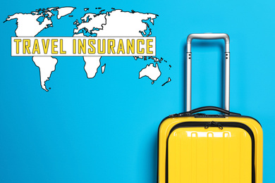 Image of Yellow suitcase and phrase TRAVEL INSURANCE on blue background