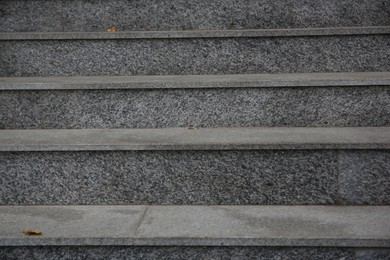 Photo of View of empty grey tile staircase outdoors, closeup