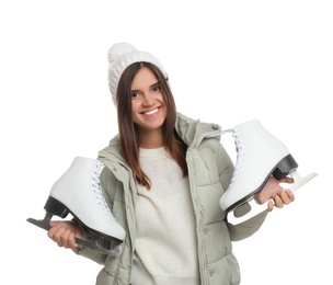 Happy woman with ice skates on white background