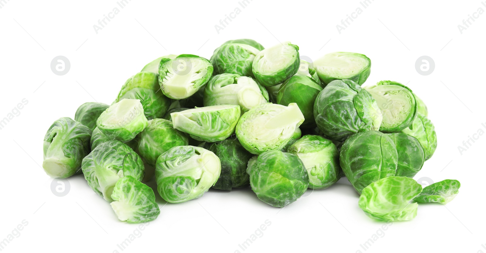 Photo of Pile of fresh Brussels sprouts isolated on white