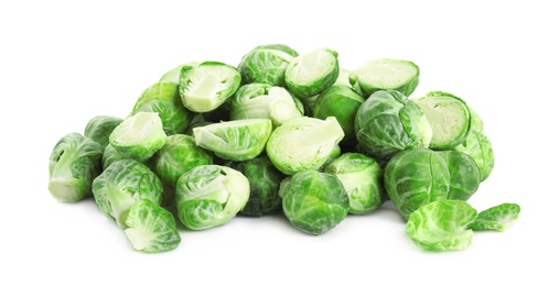 Pile of fresh Brussels sprouts isolated on white