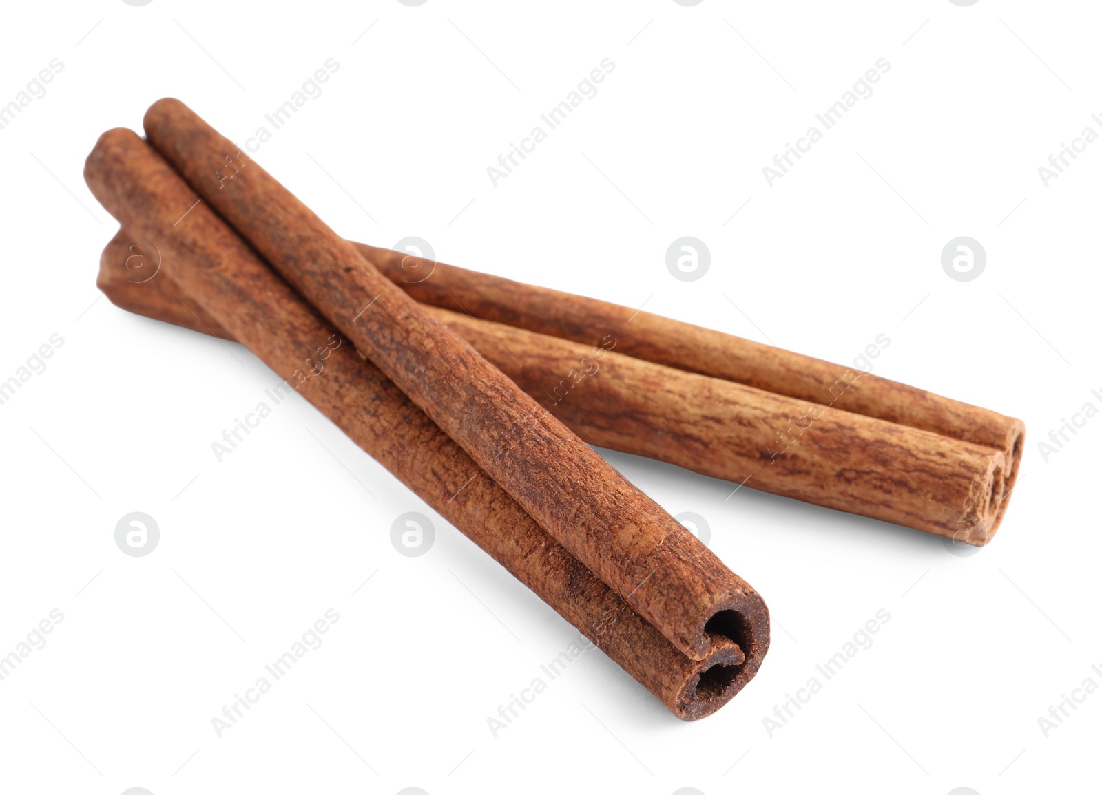 Photo of Two aromatic cinnamon sticks isolated on white