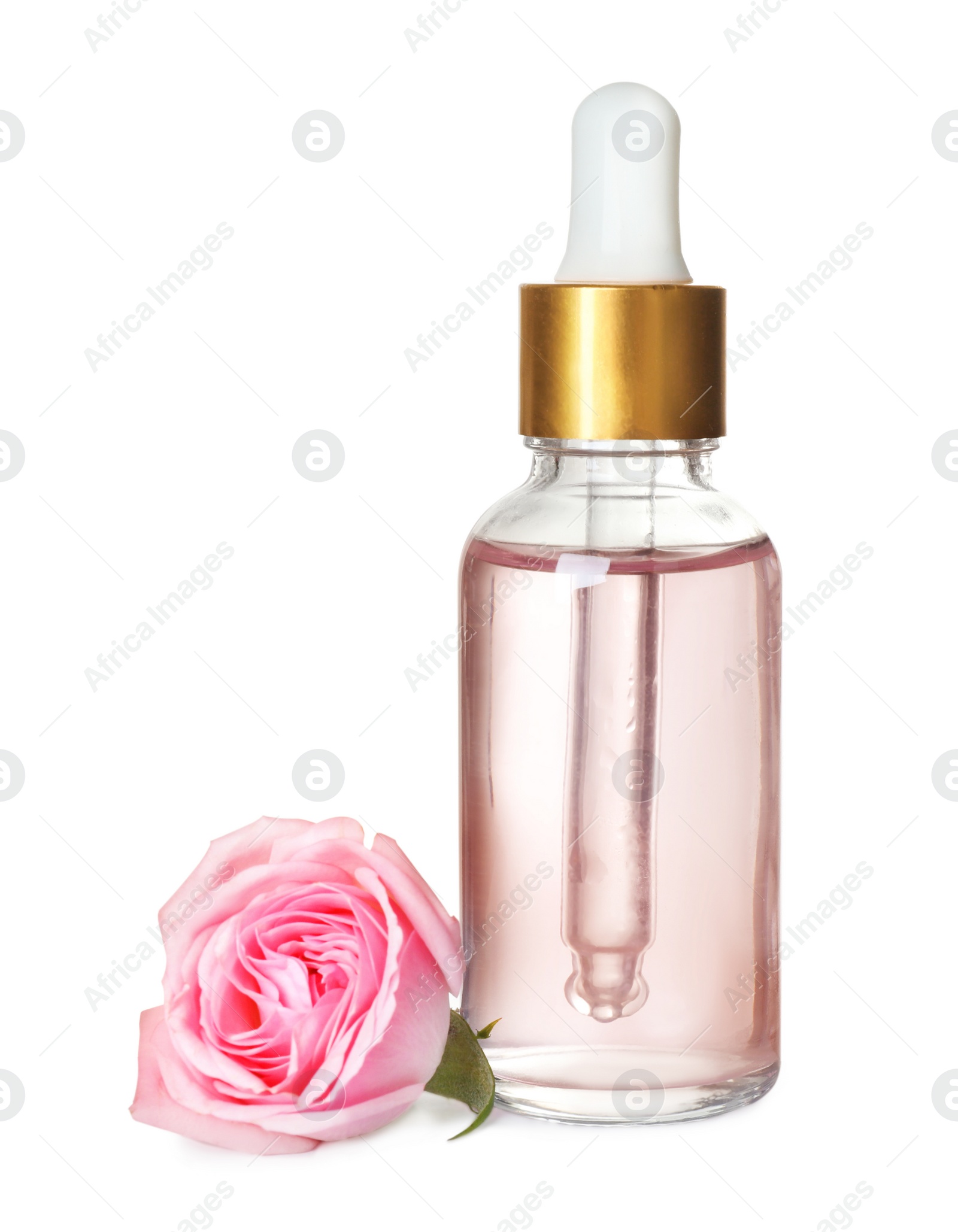 Photo of Bottle with rose essential oil and flower on white background