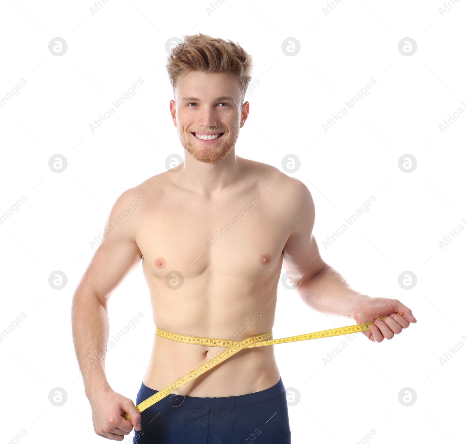 Photo of Portrait of young man with measuring tape showing his slim body on white background