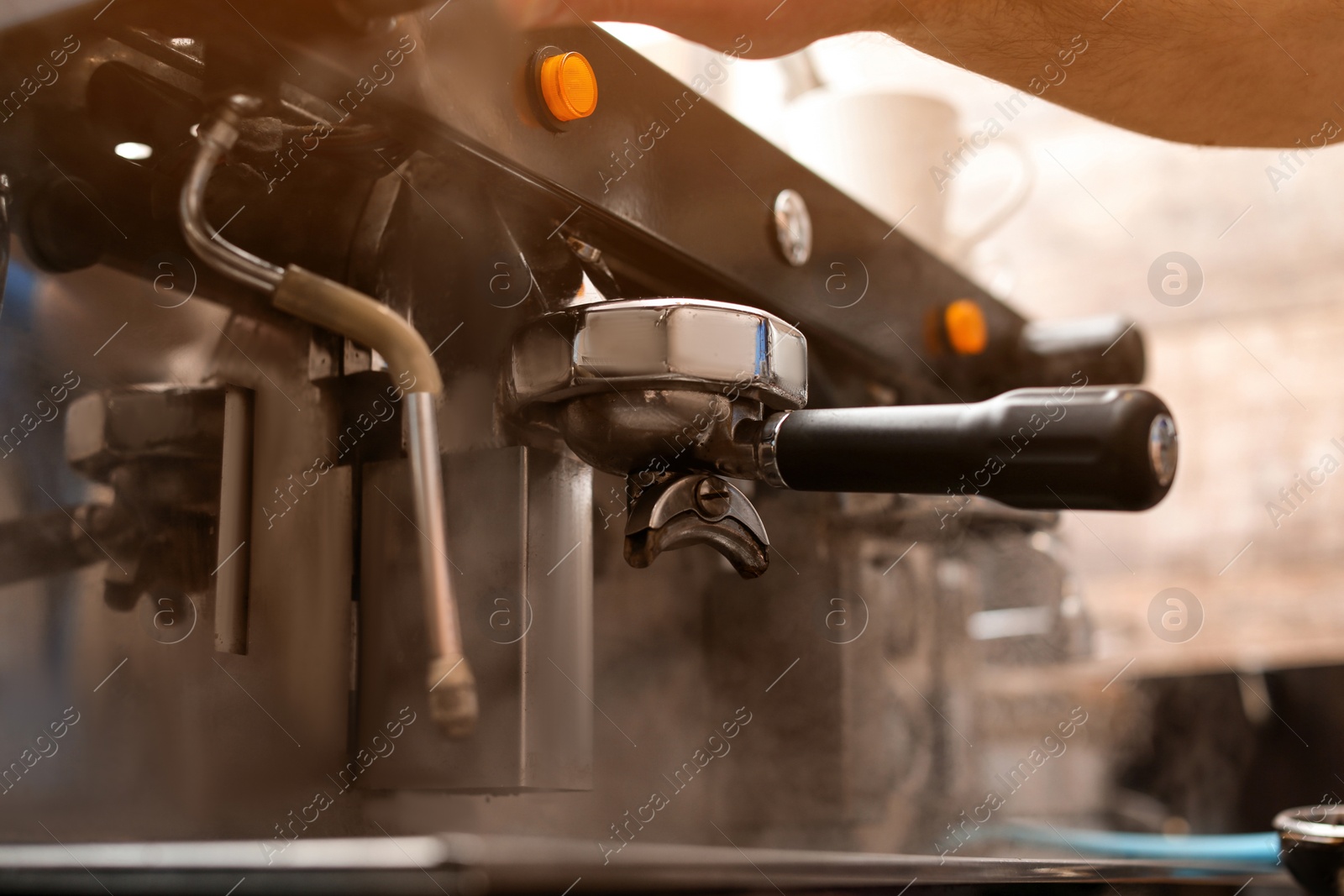 Photo of Professional coffee machine with new portafilter, closeup