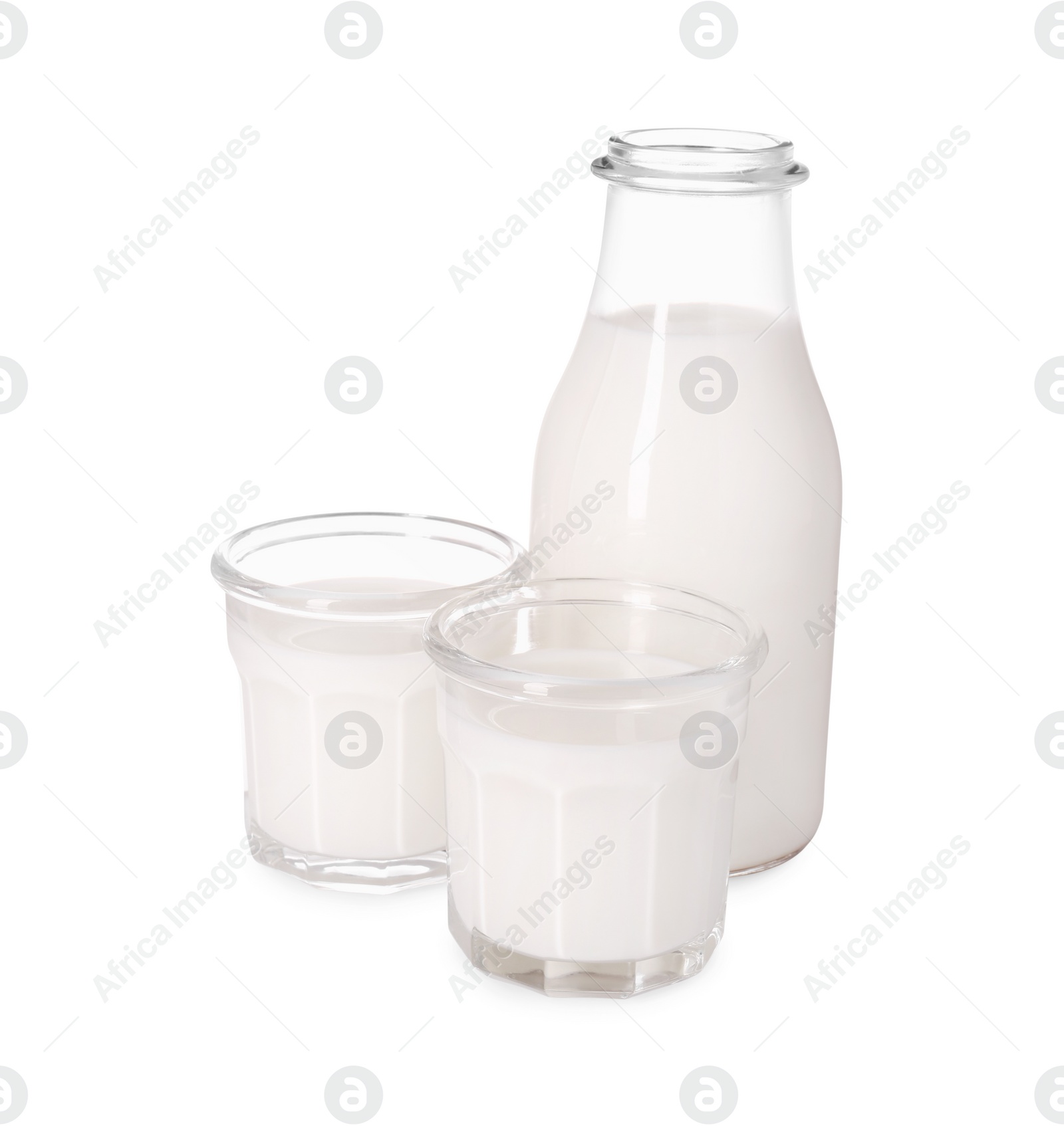 Photo of Glassware with tasty milk isolated on white