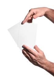 Photo of Man holding paper cards on white background, closeup. Mockup for design