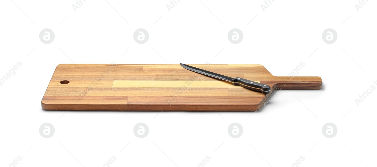 Photo of Stainless steel carving knife with plastic handle on board against white background