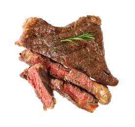 Photo of Delicious grilled beef steak with spices isolated on white, top view