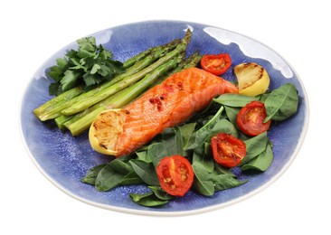 Photo of Tasty grilled salmon with tomatoes, asparagus, lemon and basil isolated on white