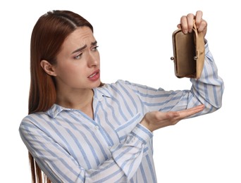 Photo of Confused woman with empty wallet on white background