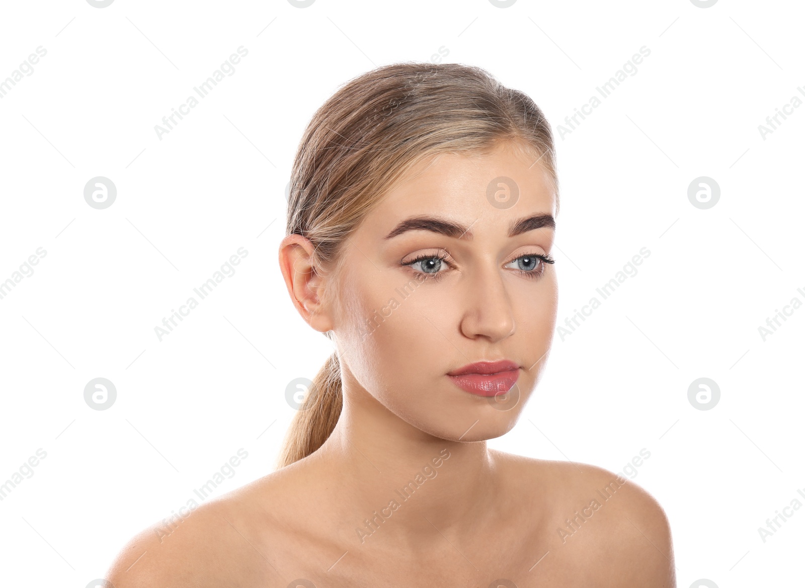 Photo of Portrait of young woman with natural eyelashes on white background