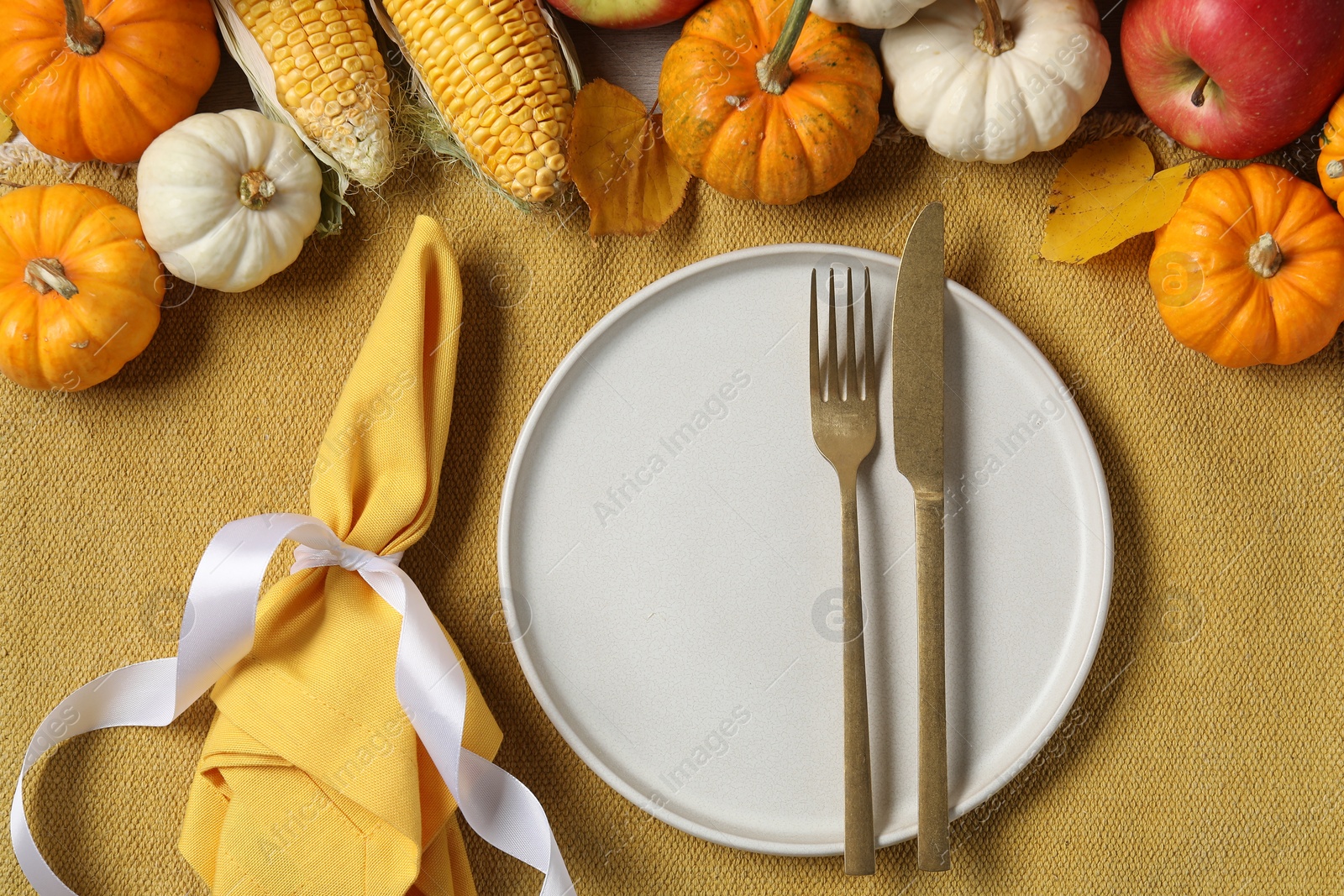 Photo of Happy Thanksgiving day. Beautiful table setting and autumn decoration, flat lay