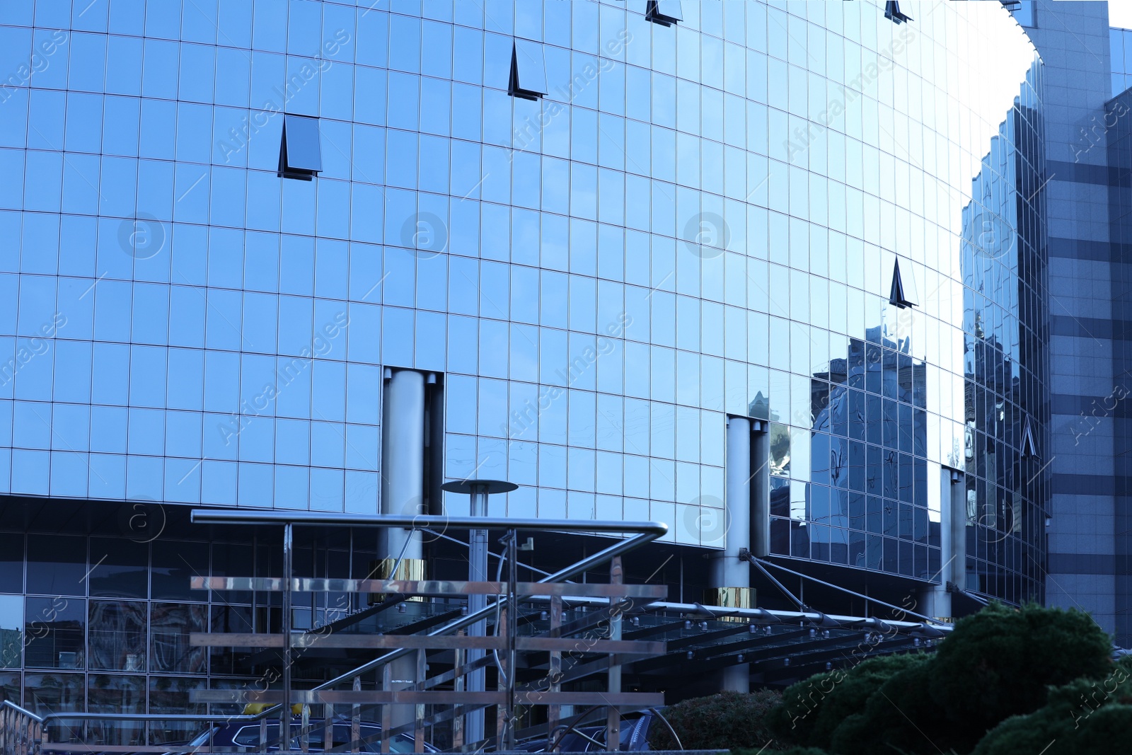 Photo of Office building with tinted windows. Modern architectural design