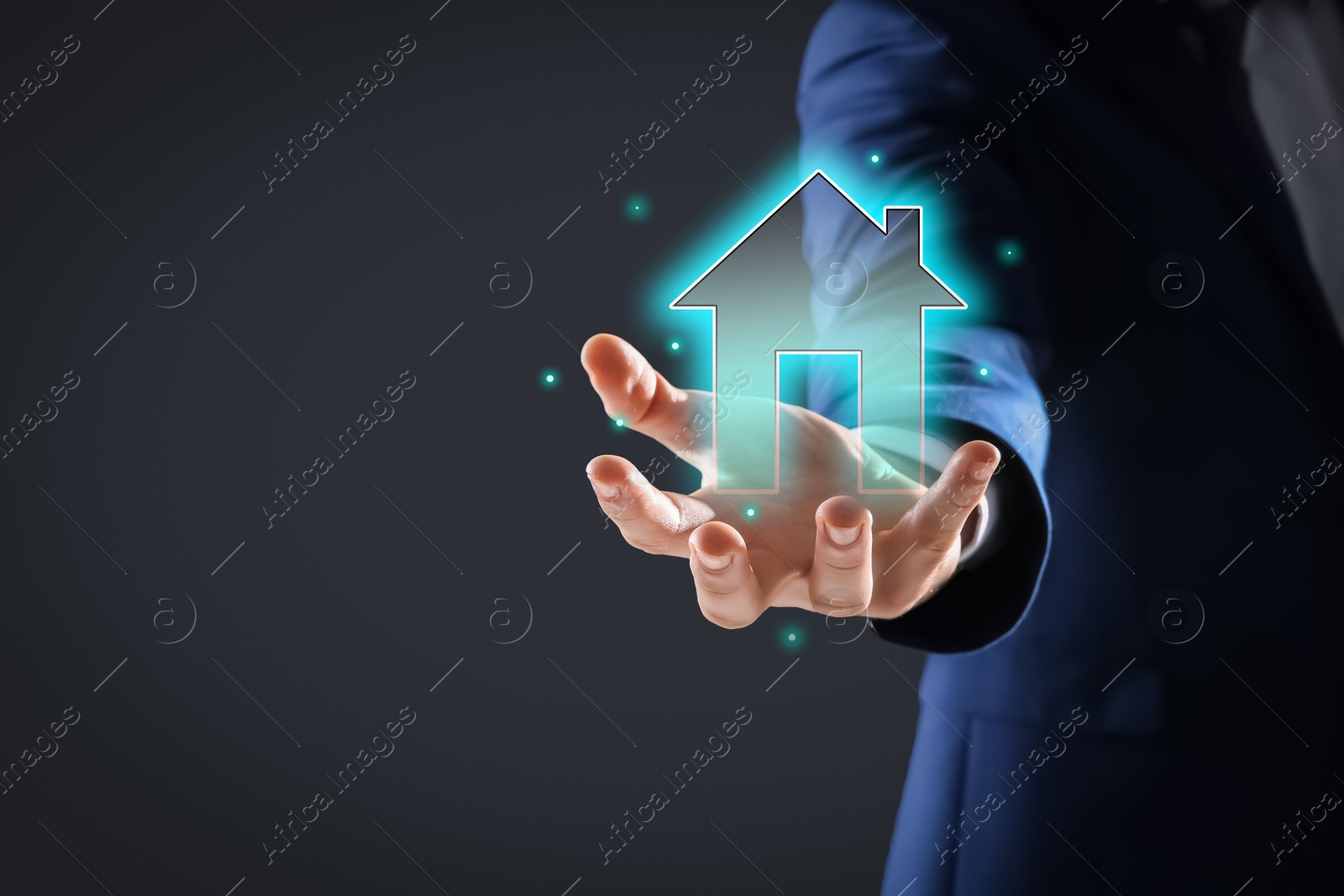 Image of Mortgage rate. Man holding illustration of house on black background, closeup. Space for text